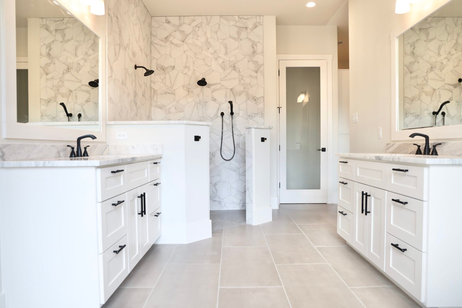 Luxury bathroom with double vanity and walk-in shower